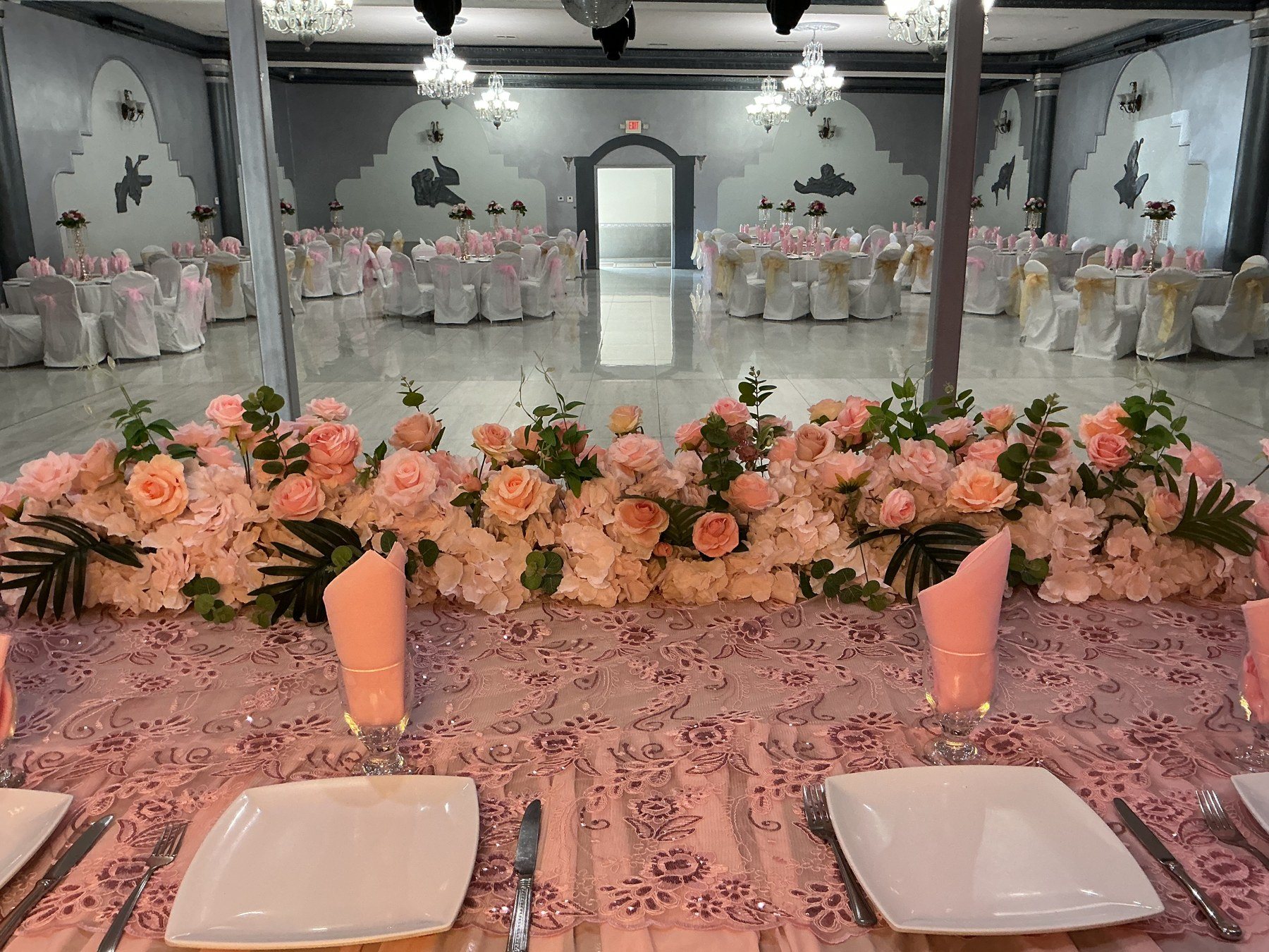 A floral runner on the head table
